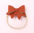 Faux leather baby bows